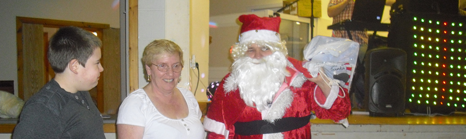 Michael Toye and Elaine Crawford meeting Santa